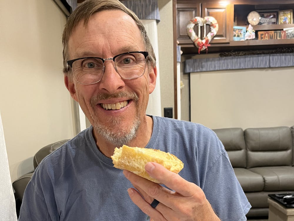 Tom enjoying fresh baked bread