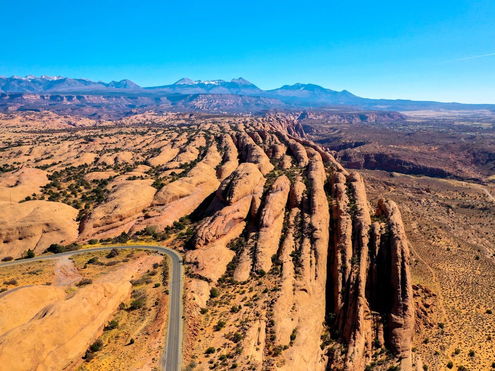 drone shot of empty road and desert