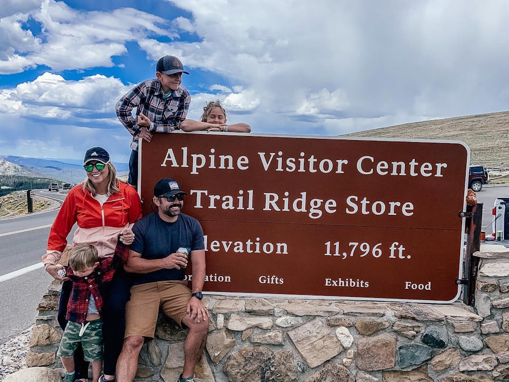 Keystone Bullet ambassador family posing by a sign