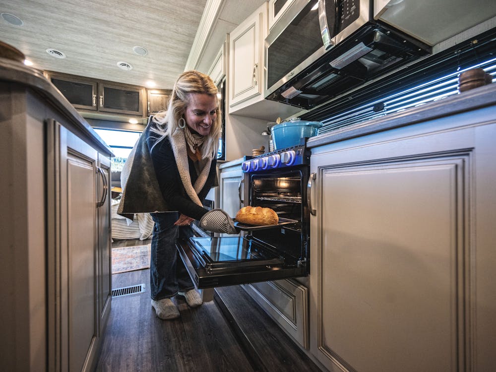 Lady baking in Cougar RV oven
