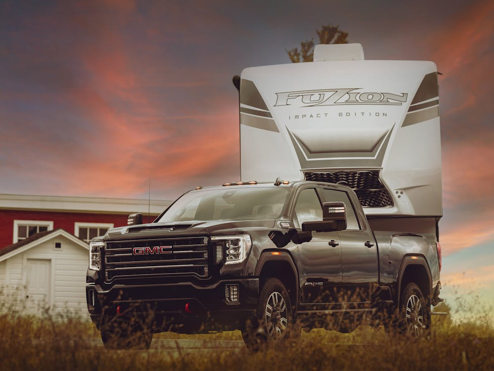 Fuzion RV with colorful sunset