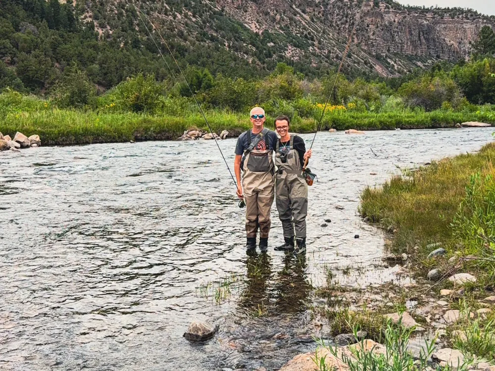 Couple fishing in a river