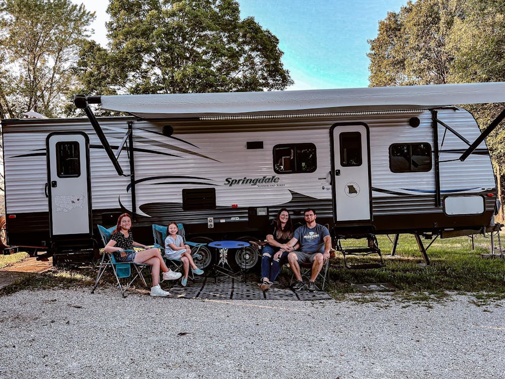 Bell family with their Springdale Bunkhouse RV