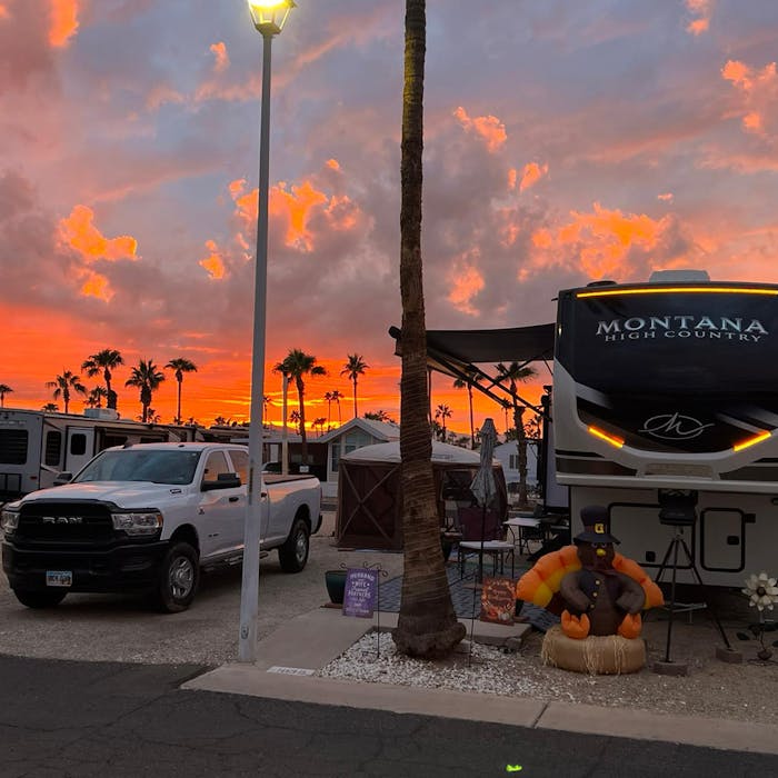 Montana RV in Arizona with colorful storm skies.