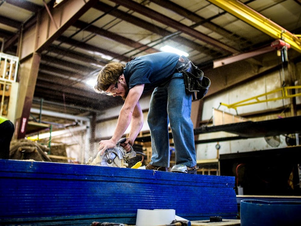 man working in RV factory
