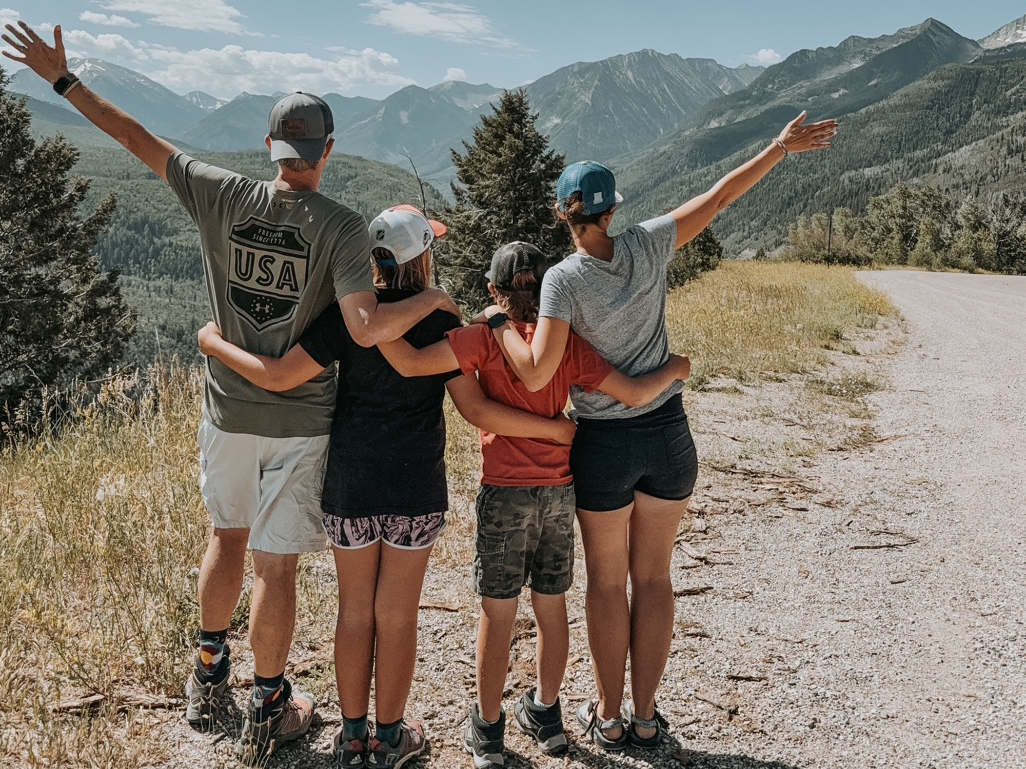 Family enjoying the mountain views on a hike